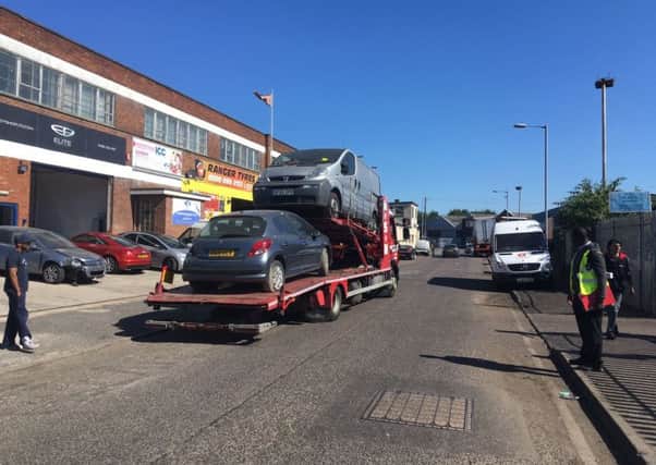 Vehicles removed from Arundel road.