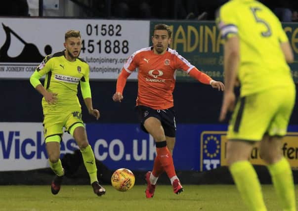 Jorge Grant tracks former Luton midfielder Olly Lee during the Hatters' 1-1 draw with Notts County last season