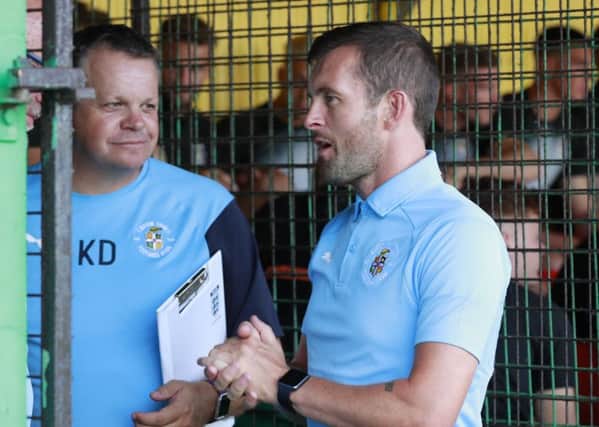 Hatters boss Nathan Jones pits his wits against a former international manager