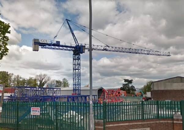 The unauthorised crane at Toddington Road     [Google]