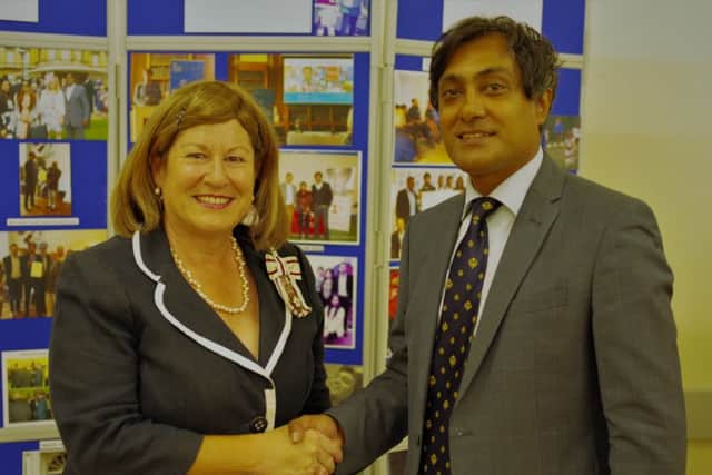 Bobby Mudhar with HM Lord-Lieutenant of Bedfordshire, Helen Nellis.