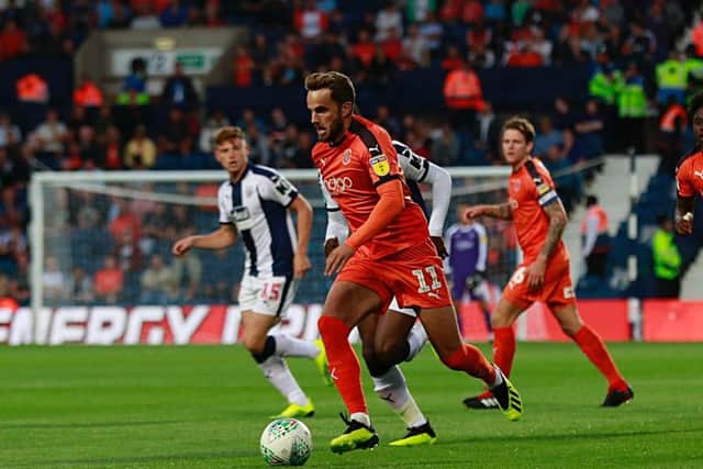 Andrew Shinnie sprints forward against West Brom