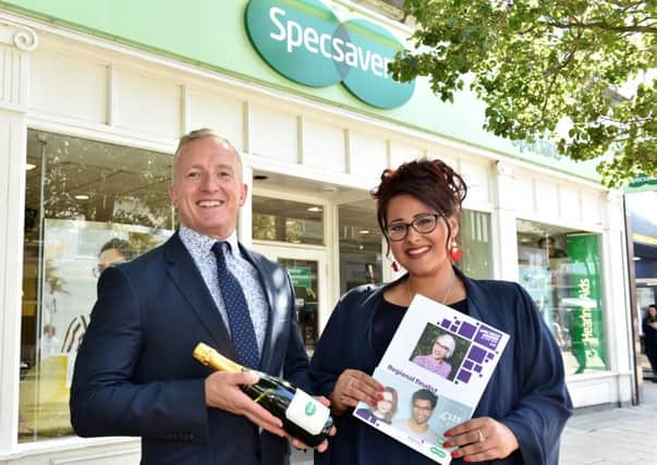 Luton Specsavers store director David Brett-Williams with Annmarie Vaughan