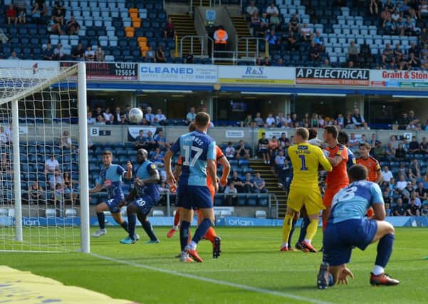 Matty Pearson heads Luton level at Wycombe on Saturday