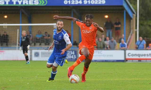 Josh Neufville has signed his first pro deal with Luton