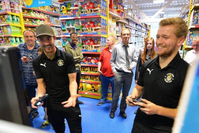 Danny Hylton and Luke Berry visited Smyths Toys to play Fifa 2019 and meet the fans. Photo: LTFC/Gareth Owen