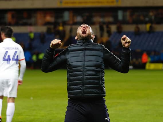 Hatters boss Nathan Jones shows his delight at beating Oxford United