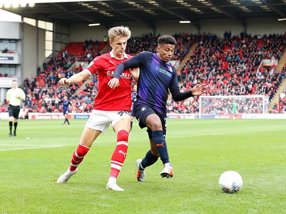 James Justin holds the ball up against Barnsley this afternoon