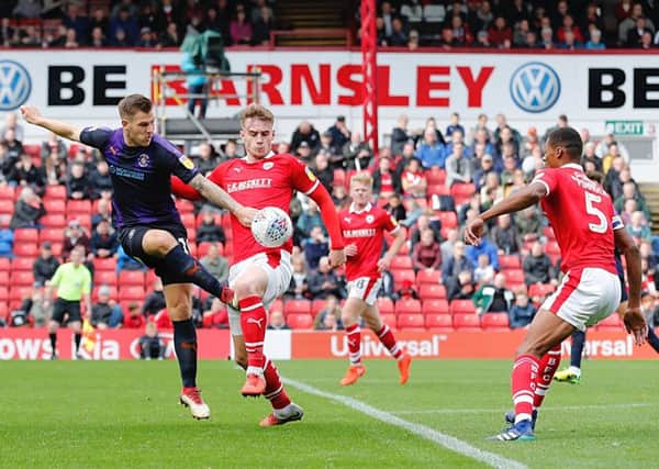 James Collins in action against Barnsley on Saturday