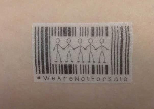 Anti Slavery Day transfer tattoos from The Salvation Army charity shop in Luton