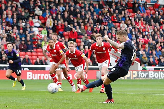 James Collins nets from the penalty spot at Oakwell