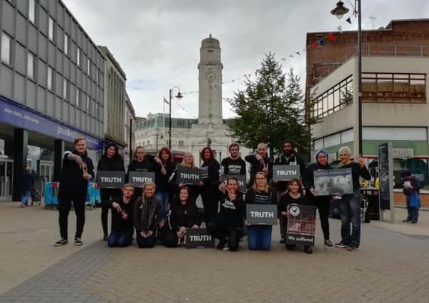 The animal rights activists in the town centre.