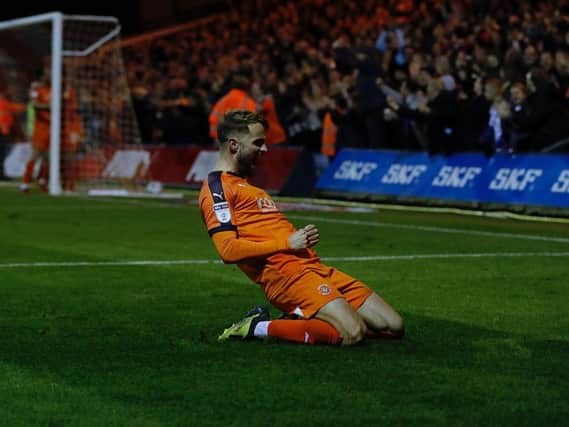 Andrew Shinnie celebrates his goal against Accrington