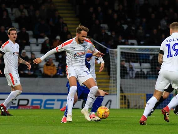 Andrew Shinnie in action against Rochdale