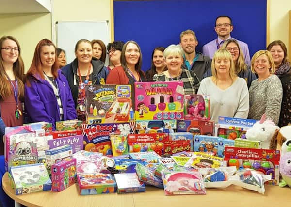 Chantry Primary Academy and Whitefield Primary School with the toys donated on the first day of the toy drive