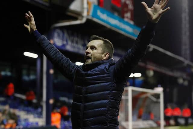 Hatters boss Nathan Jones celebrates the win over Fleetwood