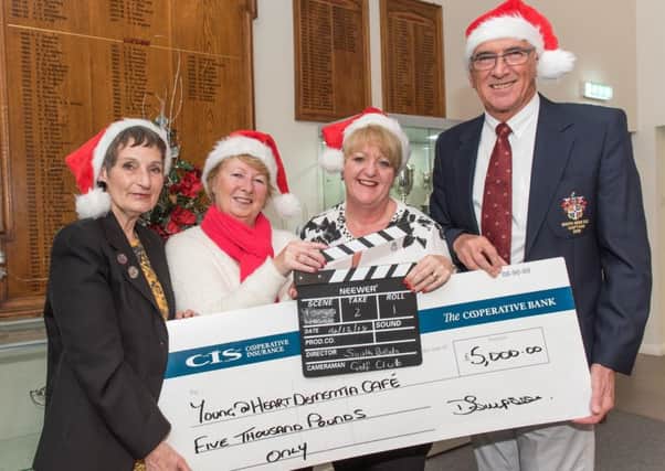Golf club donated Â£5,000 to help Young@Heart Dementia Cafe to show dementia friendly films. Photo by Joanna Cross Photography