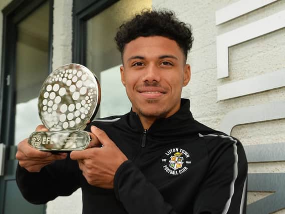Town defender James Justin with his EFL Young Player of the Month award