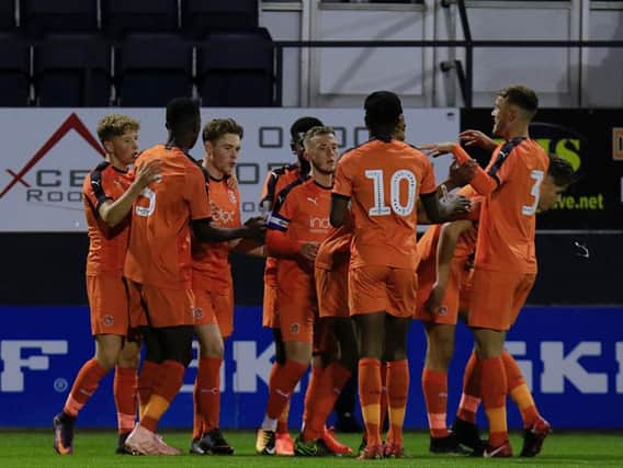 Luton's talented U18s side celebrate a goal in the FA Youth Cup this season