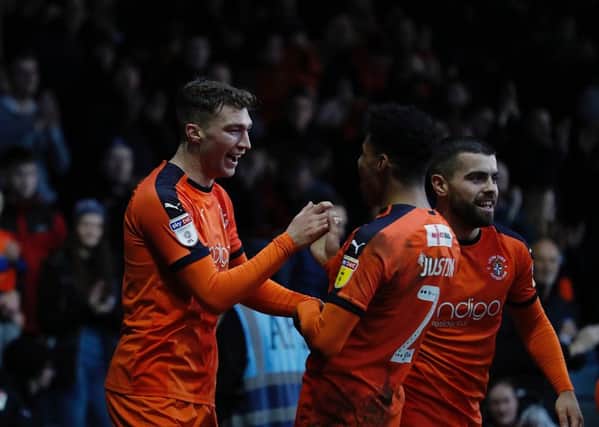 Jack Stacey celebrates his opening goal for the Hatters against Burton