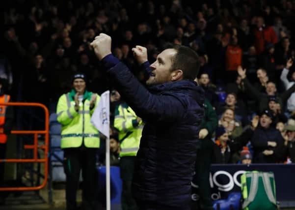 Nathan Jones celebrate victory with the Luton supporters on Saturday