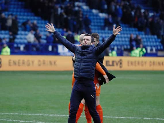Luton boss Nathan Jones salutes Town's travelling fans at the final whistle