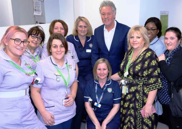 Paul Young with staff at the opening of the L&Ds new Pre-Assessment Unit. Photo by Debra Rapp