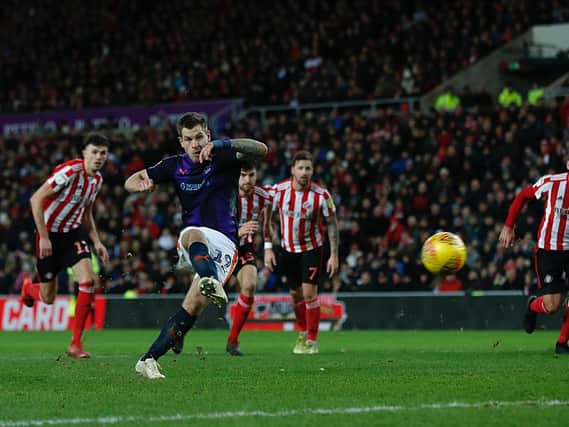 James Collins equalises from the penalty spot at Sunderland