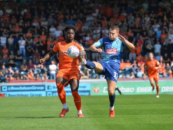 Bryn Morris in action for Wycombe against Luton
