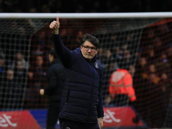 Hatters interim boss Mick Harford gives Town's supporters a thumbs up