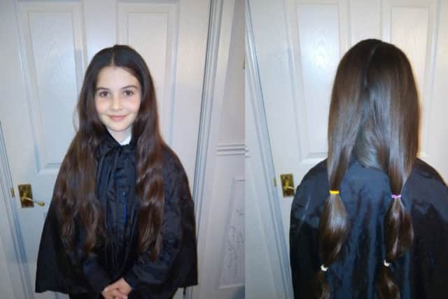 Jessica's hair before she cut off just under 14 inches of her hair