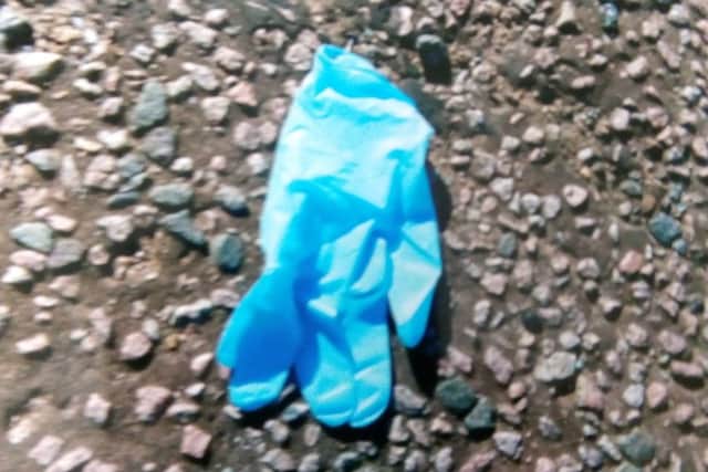 A used protective glove found by the residents.