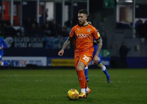 George Moncur on the ball for Luton