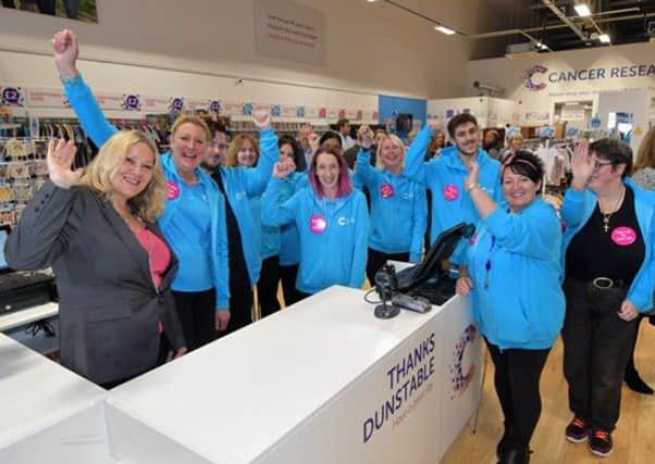 Cancer survivor Denise Coates with the Dunstable team at the shop opening. 
Photo by: Sean Dillow.
www.TheBigCheesePhotography.co.uk