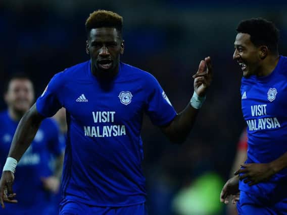 Cardiff striker Omar Bogle has joined Portsmouth in time to face Luton