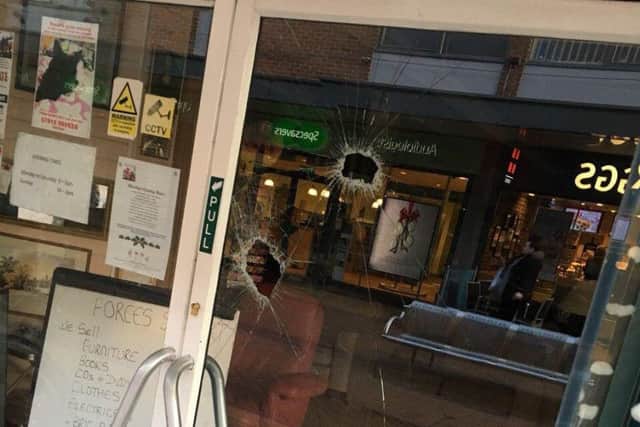 The front doors of Forces Support charity shop in Dunstable were smashed during an attempted break-in