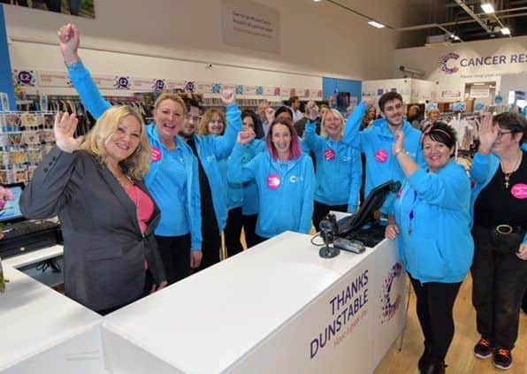 Cancer survivor Denise Coates with the Dunstable team at the shop opening.  Photo by: Sean Dillow. www.TheBigCheesePhotography.co.uk