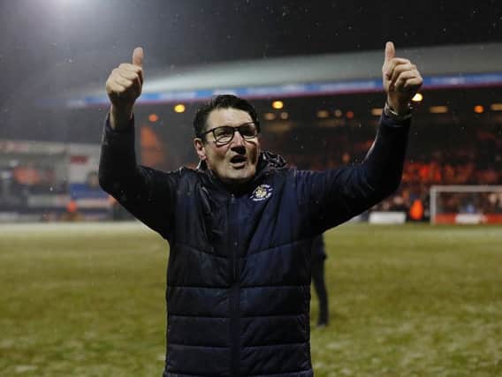 Mick Harford acknowledges the crowd on the final whistle