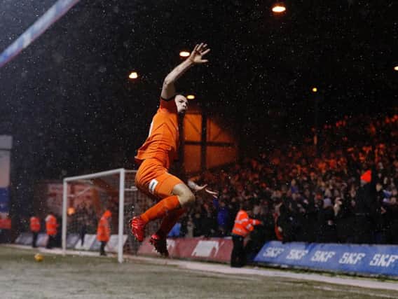 James Collins celebrates his goal against Portsmouth