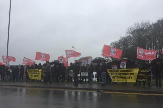 Workers braved the elements to make a stand against Addison Lee