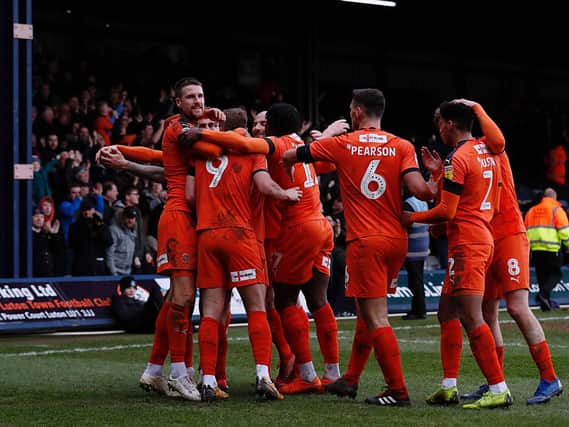 Luton celebrate James Collins' opening goal of the afternoon