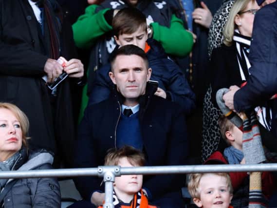 Ireland assistant coach Robbie Keane watches on at Kenilworth Road