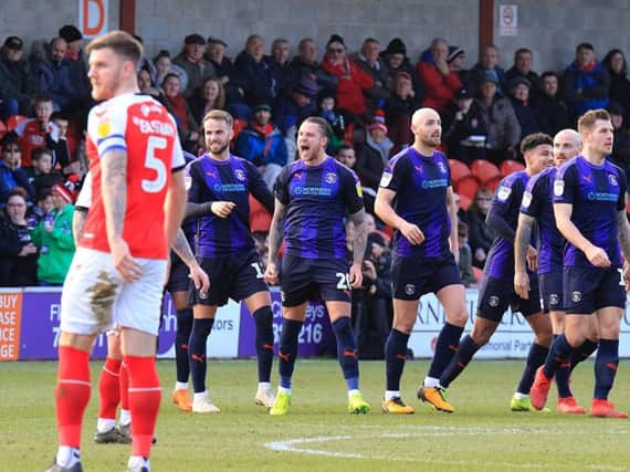 George Moncur celebrates his opening goal at Fleetwood