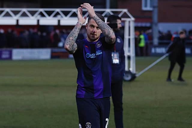George Moncur applauds Town's fans at Fleetwood
