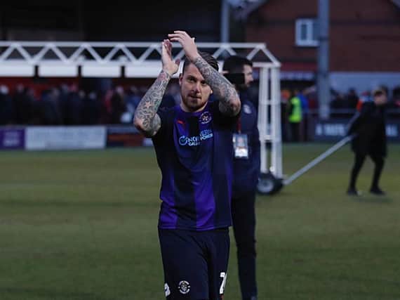 George Moncur applauds Town's fans at Fleetwood