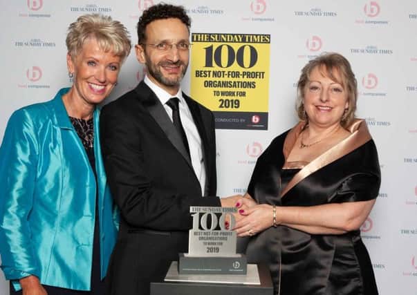 Keech Hospice Care trustee Karen Proctor, Deputy Editor at Sunday Times 100 Best Companies Nick Rodrigues, and Keech CEO Liz Searle at the awards ceremony on February 20.