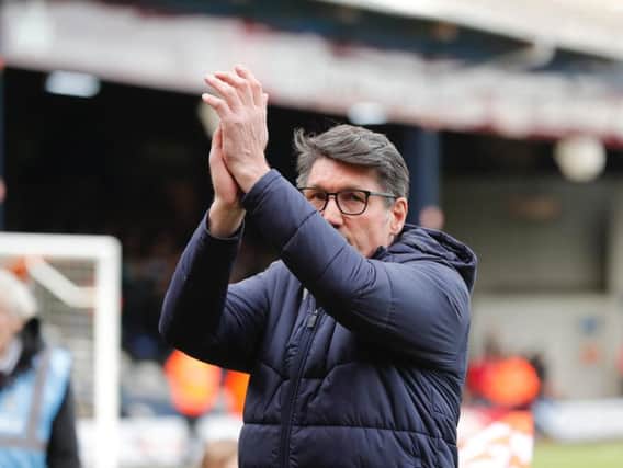 Hatters boss Mick Harford applauds the Luton supporters
