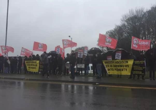 Minicab drivers protested against pay and conditions working for Addison Lee last month