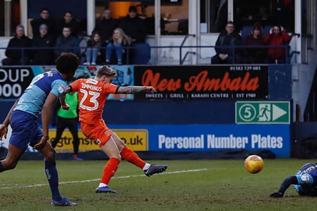 Jason Cummings starts for the Hatters at Peterborough this afternoon
