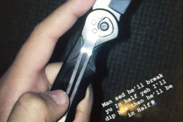 The knife image that was sent to their son on social media by the bullies.
